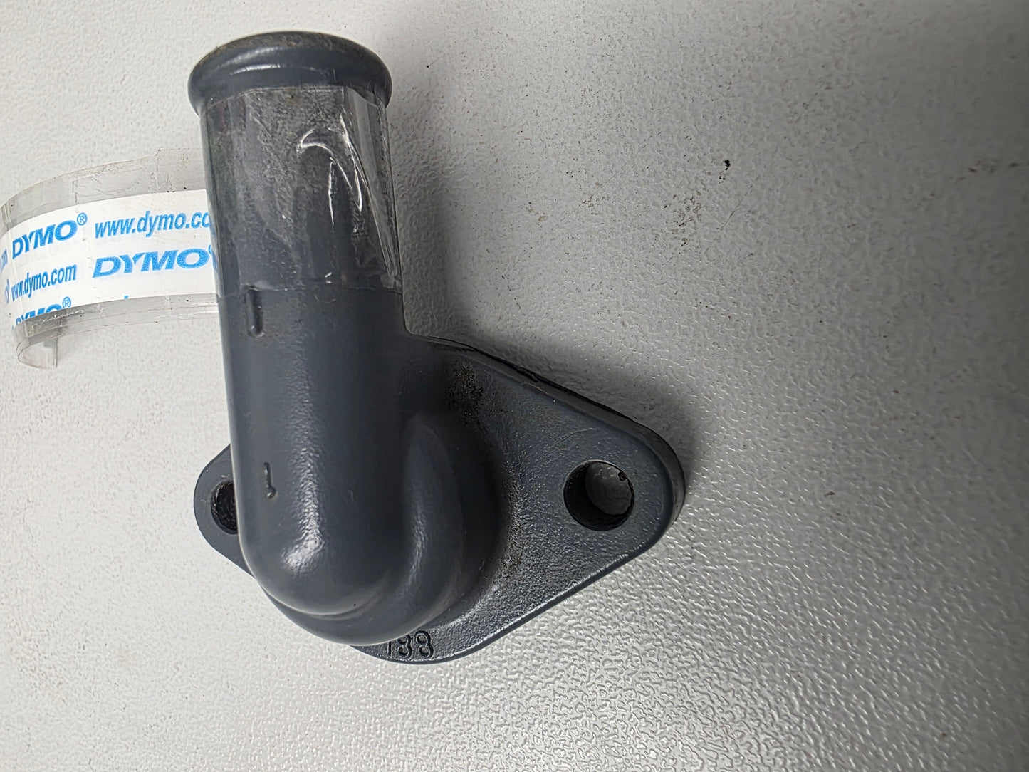 17681-88L00 Suzuki DF60A Thermostat Cover | Genuine Used Part