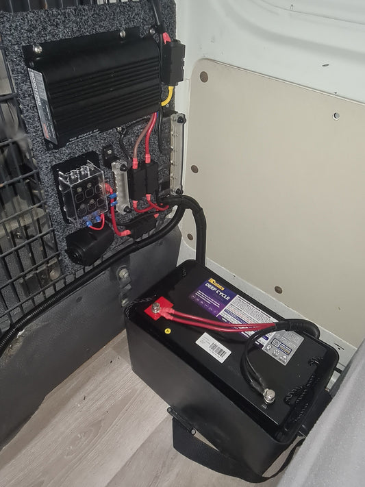 Century deep cycle battery installed with a DC charger and fuse panel