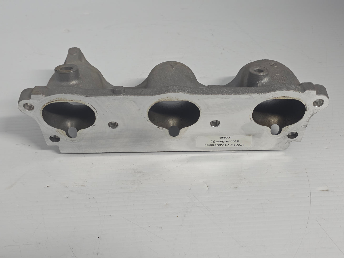 17061-ZY3-A00 Honda Injector Base (L) | Genuine Used Part