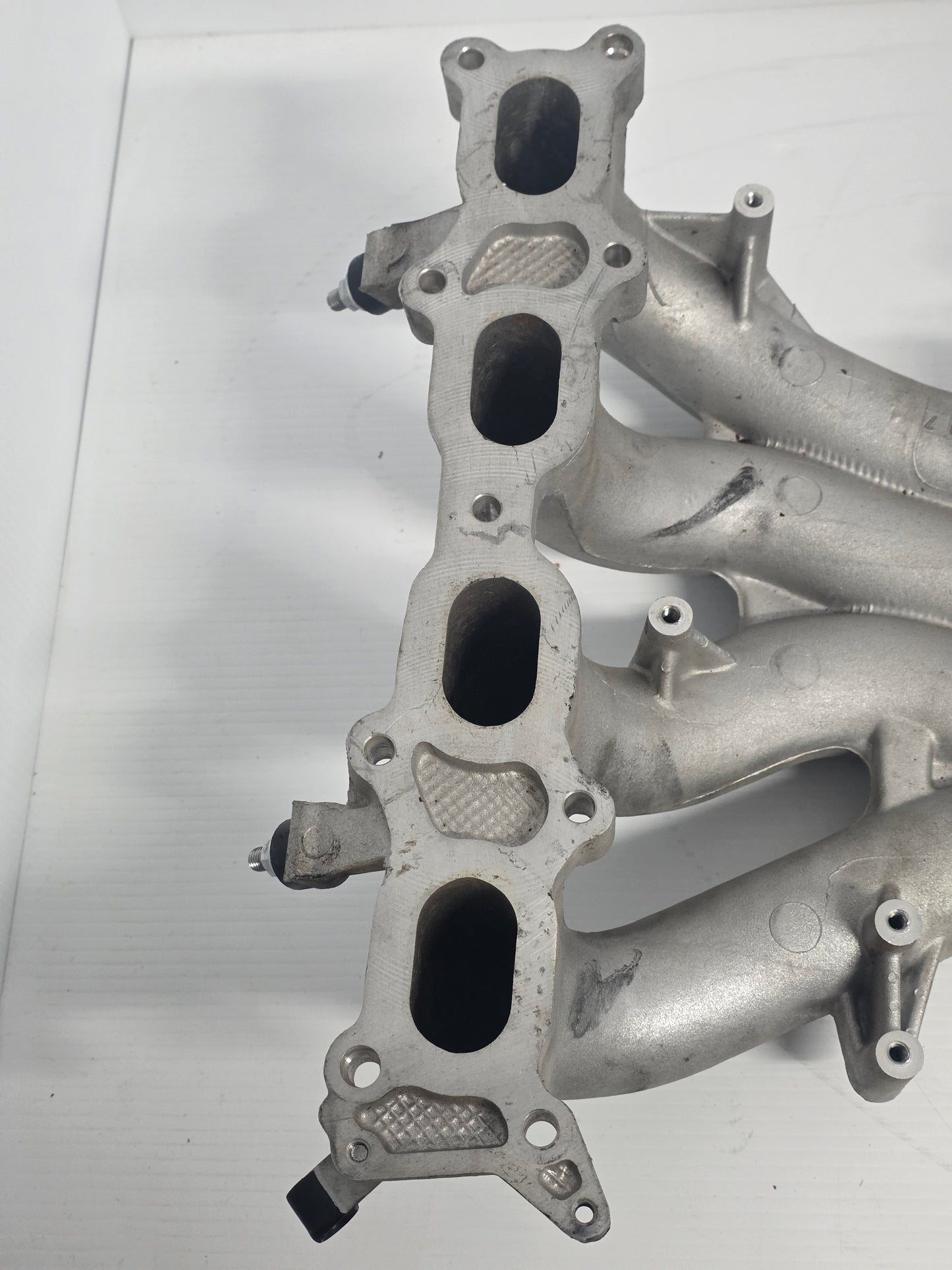 13110-90J02 Suzuki 5033535 Johnson Intake Manifold 90HP 100HP 115HP 140HP | Genuine Used Part