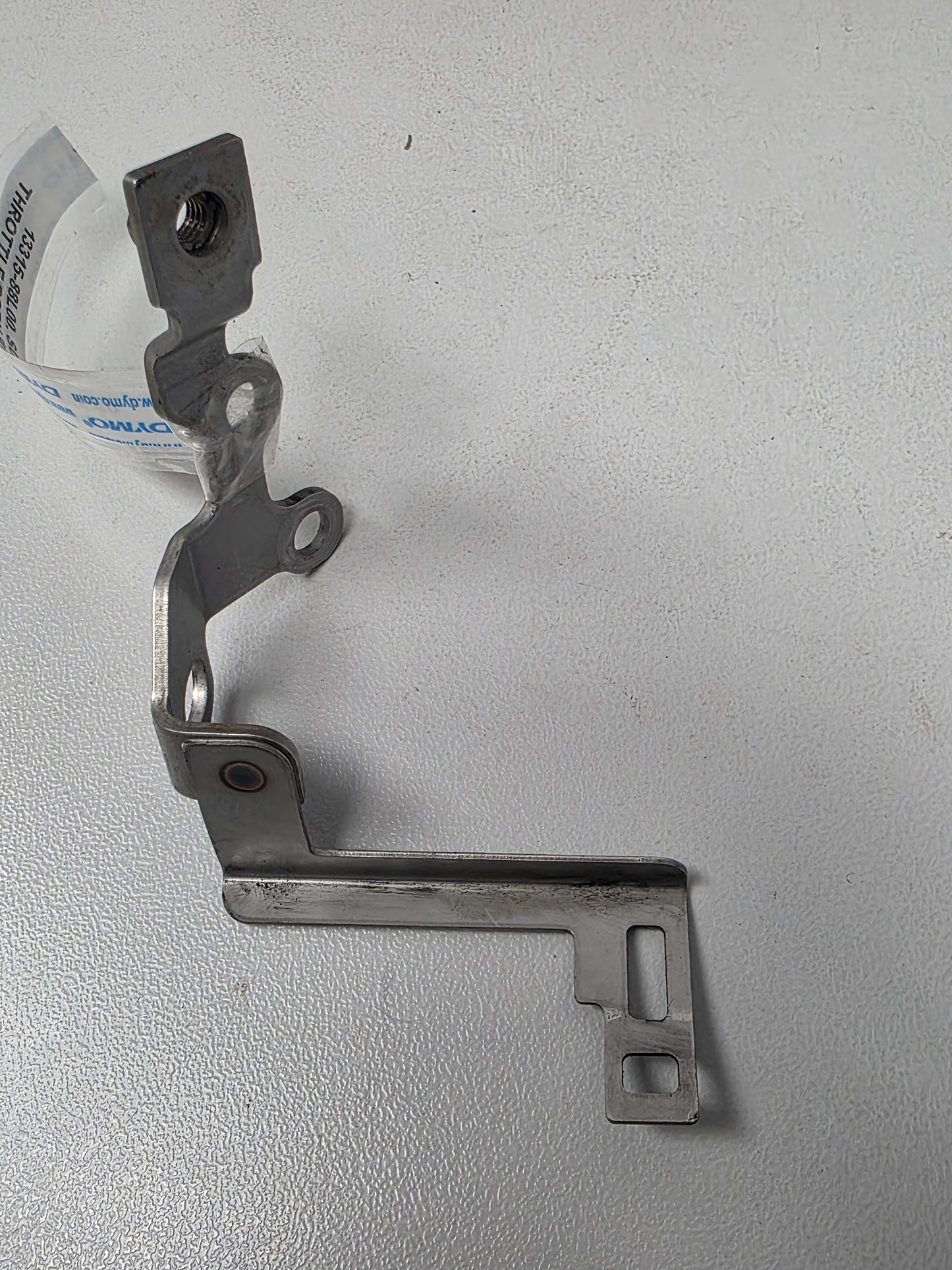 13315-88L00 Suzuki DF60A Throttle Body Bracket | Genuine Used Part