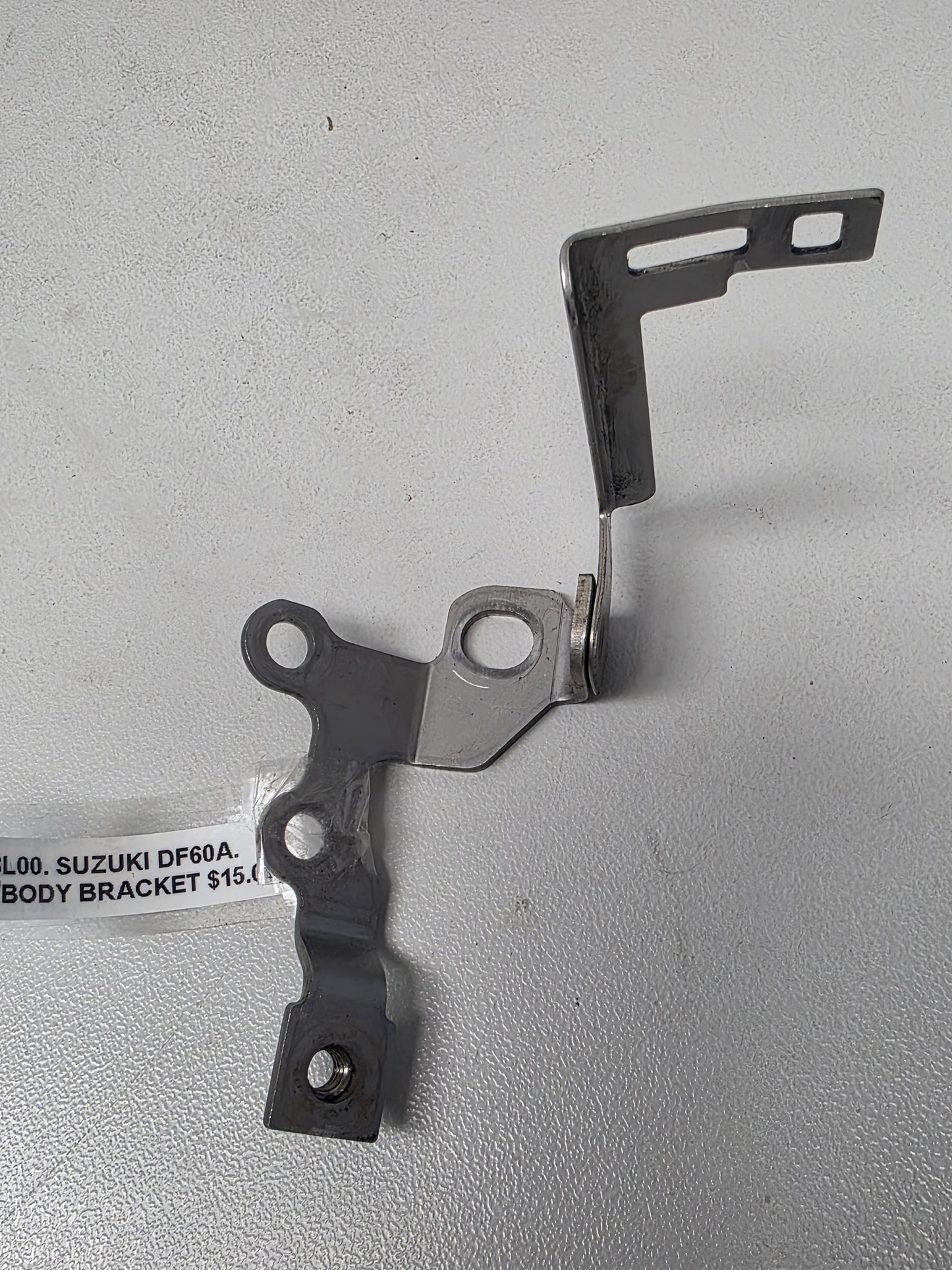 13315-88L00 Suzuki DF60A Throttle Body Bracket | Genuine Used Part
